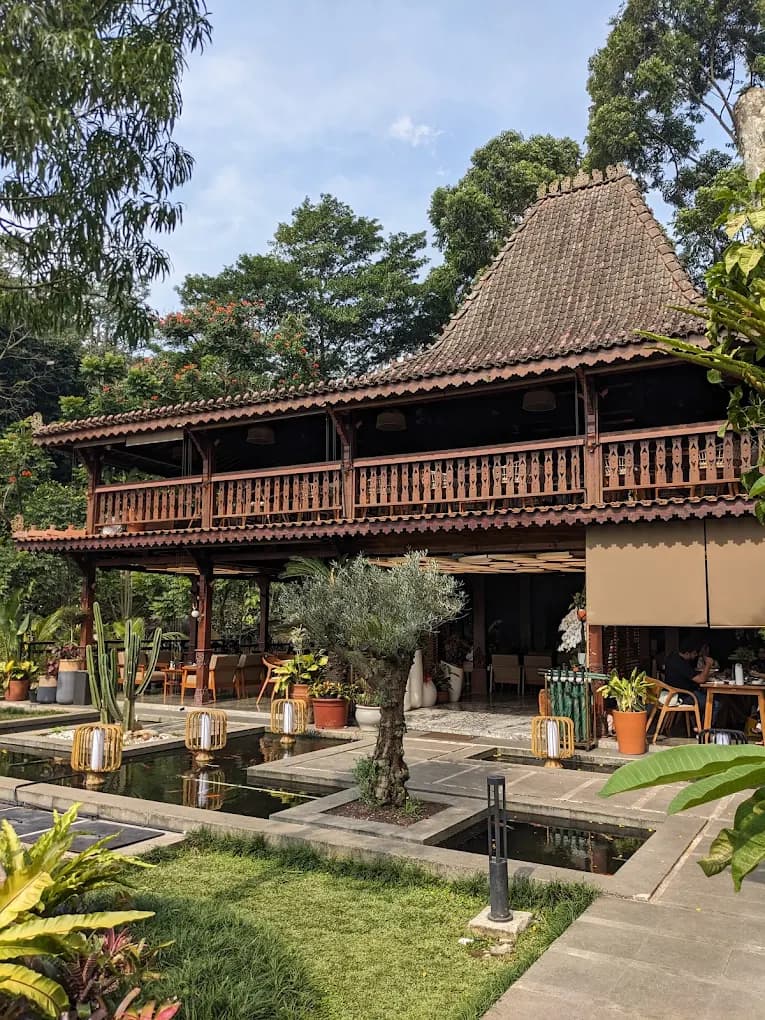 The Bottle Tree Restaurant exterior surrounded by greenery