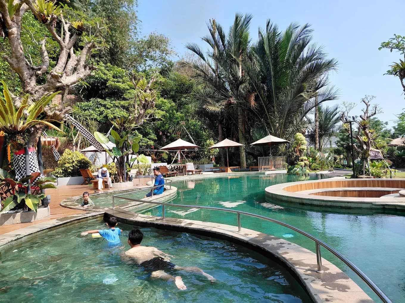 Outdoor swimming pool at Kian Mas resort